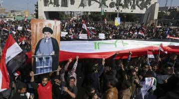 هواداران مقتدی صدر چهار وزارتخانه عراق را محاصره کردند 