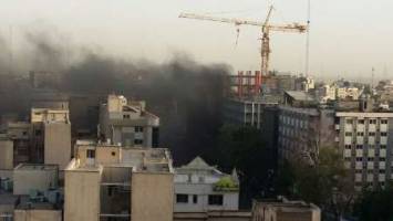 آتش سوزی در خیابان ولیعصر تهران یک مصدوم به جا گذاشت