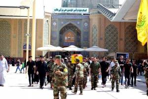 تشییع جنازه ۱۳ شهید در درگیری‌های اخیر حلب در عراق