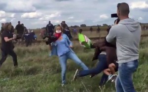 Petra-Lazlo-Camerawoman-Kicking-and-Tripping-Refugee-with-child