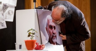 بوسه بازیگر مشهور بر تصویر شهید مدافع حرم